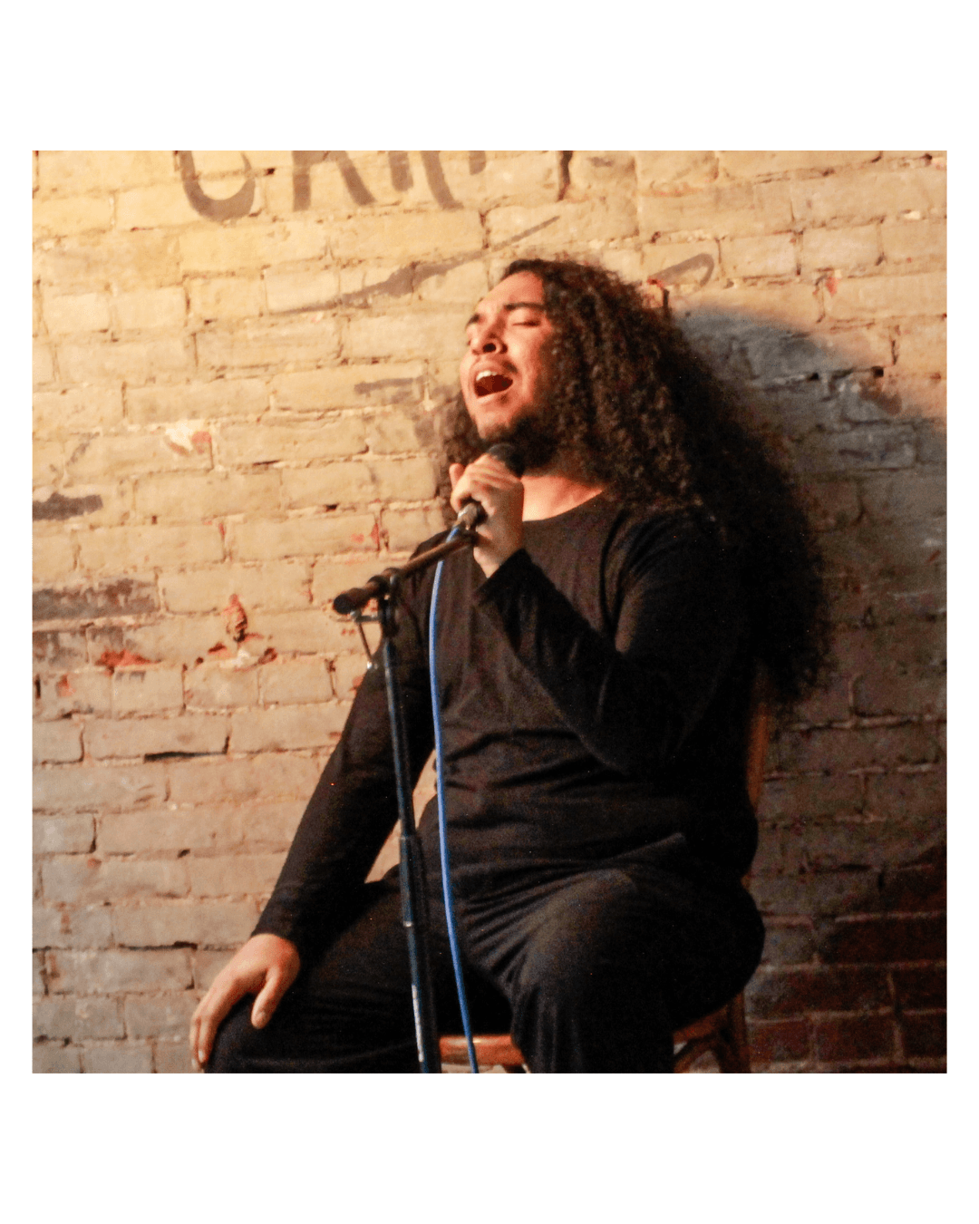 Johnny Kocur delivering an acoustic performance.